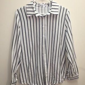 Womens black and white silky blouse. Brand new